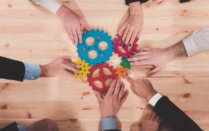 Business,Team,Connect,Pieces,Of,Gears.,Teamwork,,Partnership,And,Integration